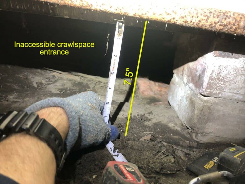inaccessible crawlspace entrance - measuring crawlspace for inspection